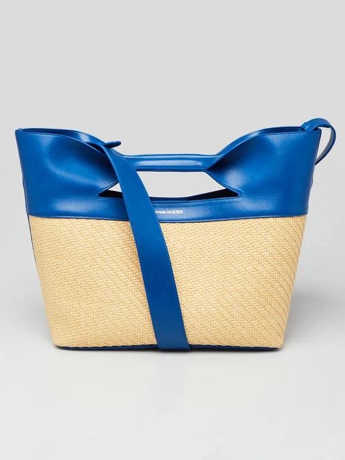 Alexander McQueen Natural/Electric Blue Leather and Straw Small Bow Tote Bag: Handle Drop: 20" Measurements: 15" L x 5.5" W x 11.5" H. Condition: Pre-owned - Good,Brand: Alexander McQueen,Style: Everyday Bags,Totes,Department: Women,Exterior Color: Blue,Beige,Exterior