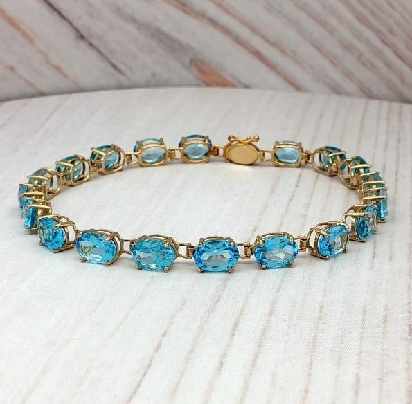 Aquamarine Tennis Bracelet In 14k Yellow Gold.: Dimensions: 7.5 inches L * 5.07mm W.. Condition: Pre-owned - Good,Antique: No,Closure: Box,Occasion: Anniversary, Birthday, Christmas, Graduation, Mother's Day, Valentine's Day, Wedding,Main Stone
