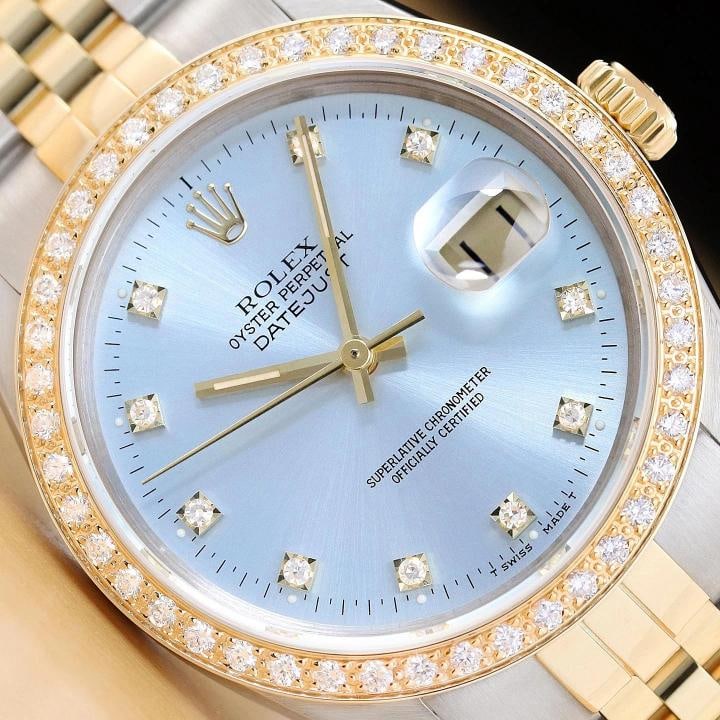 ROLEX MENS DATEJUST 16233 ICE BLUE FACTORY DIAMOND 18K YELLOW GOLD STEEL WATCH: This is an authentic Rolex Datejust 16233 watch with a two tone 18K yellow gold and stainless steel jubilee bracelet, factory Rolex diamond dial Ref., and custom 18K yellow gold diamond bezel. Descrip