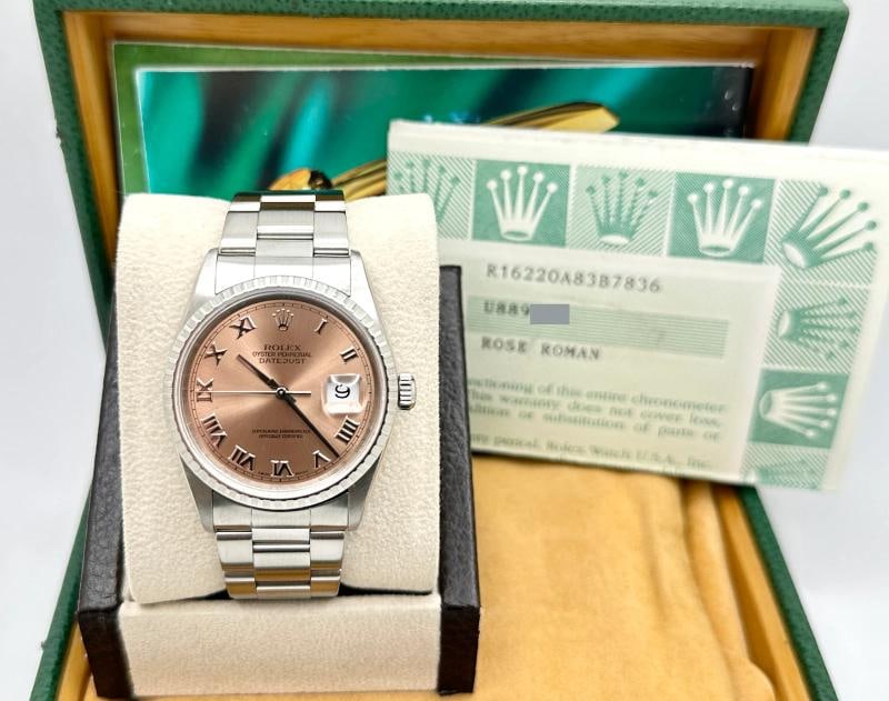 Rolex Datejust 16220 Rose Salmon Pink Roman Dial Engine Turn Steel Box Papers: Style Number: 16220 Serial: U889*** Year: 2000 Model: Rolex Datejust Case Material: Stainless Steel Band: Stainless Steel Bezel: Stainless Steel Engine Turn Dial: Rose Salmon Pink Roman Dial Crystal: