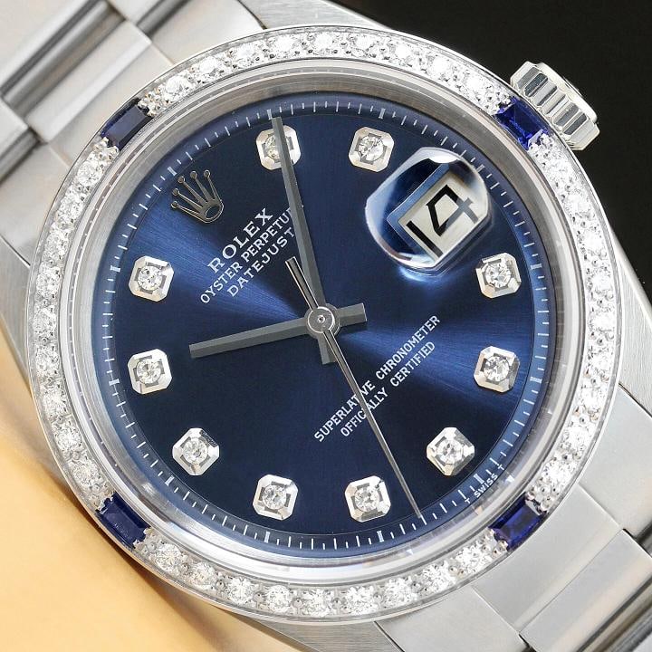 MENS ROLEX DATEJUST BLUE DIAMOND SAPPHIRE 18K GOLD STAINLESS STEEL OYSTER WATCH: Condition: Pre-owned - Excellent,Bezel Color: Silver,Max Wrist Size: 7.26-7.5 in,Number of Jewels: 26 Jewels,Indices: Diamond Hour Marks, 12-Hour Dial, Multiple Hands,Bezel: Custom 18K White Gold Sapp