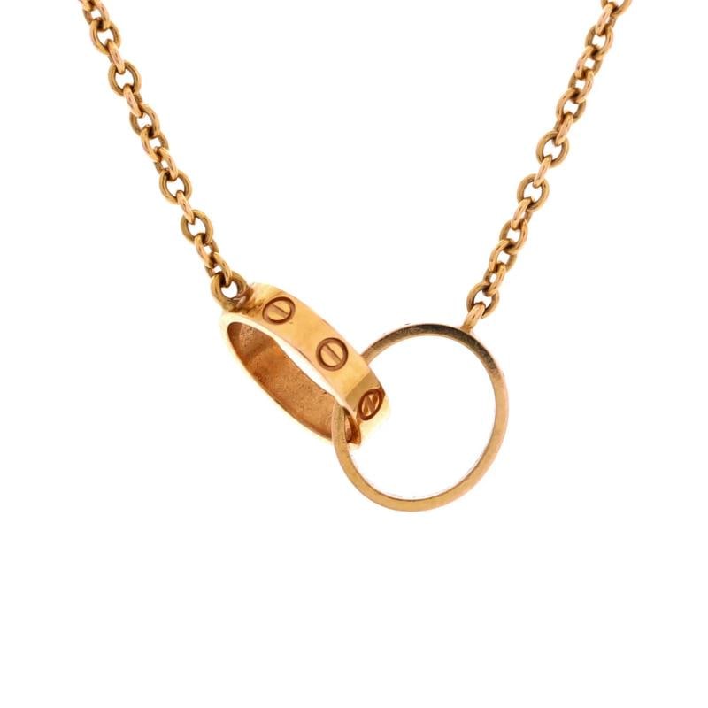 Cartier Love Interlocking Necklace 18K Rose Gold: Condition: Pre-owned - Good,Brand: Cartier,Main Stone: Unknown,Metal: 18K Rose Gold,Metal Purity: 18K,Style: Necklace,Type: Necklace,Color: Rose Gold,Material: 18K Rose Gold