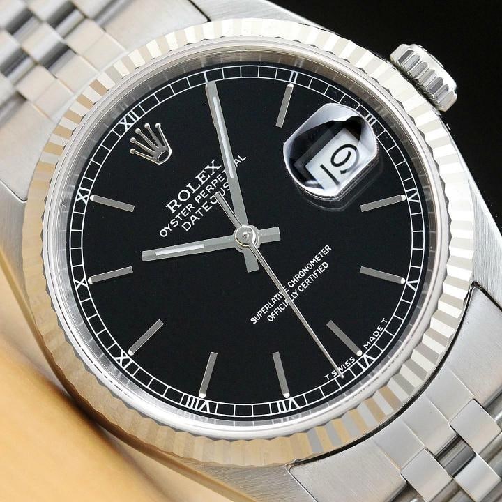 ROLEX MENS DATEJUST 16234 BLACK DIAL 18K WHITE GOLD STAINLESS STEEL WATCH: Condition: Pre-owned - Excellent,Bezel Color: Silver,Max Wrist Size: 7.26-7.5 in,Number of Jewels: 31 Jewels,Indices: Stick Indexes, 12-Hour Dial,Bezel: Rolex 18K White Gold Fluted Bezel,Band/Strap: B