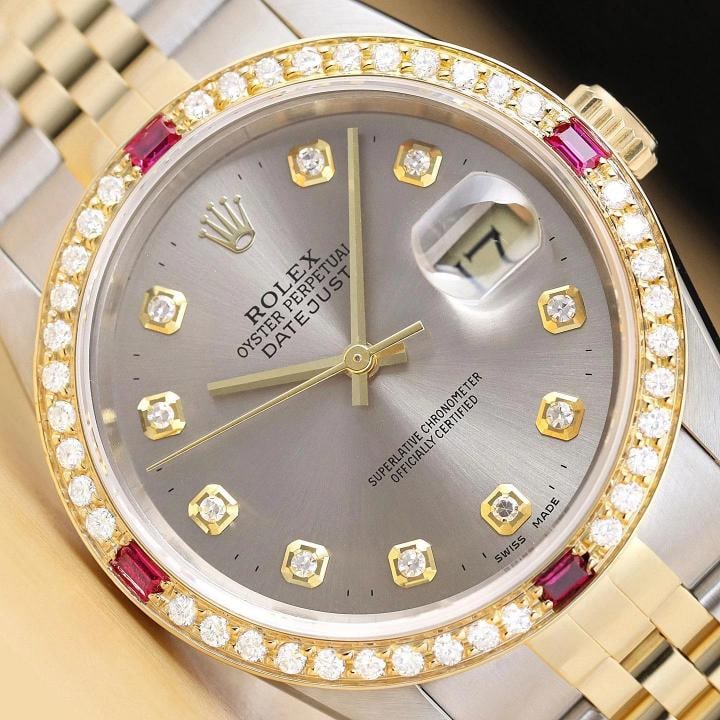 ROLEX MENS DATEJUST 16233 GRAY DIAL 18K YELLOW GOLD STEEL DIAMOND RUBY WATCH: This is an authentic Rolex Datejust 16233 watch with two tone 18K yellow gold and stainless steel jubilee bracelet, Rolex dial Ref. with added genuine diamond markers, and custom 18K yellow gold diamo