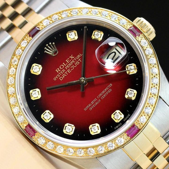 ROLEX MENS DATEJUST 16013 RED VIGNETTE 18K YELLOW GOLD RUBY DIAMOND STEEL WATCH: This is an authentic Rolex Datejust 16013 watch with Rolex 18K yellow gold and stainless steel jubilee bracelet, Rolex dial Ref. with added diamond hour markers, and custom 18K yellow gold ruby diamon
