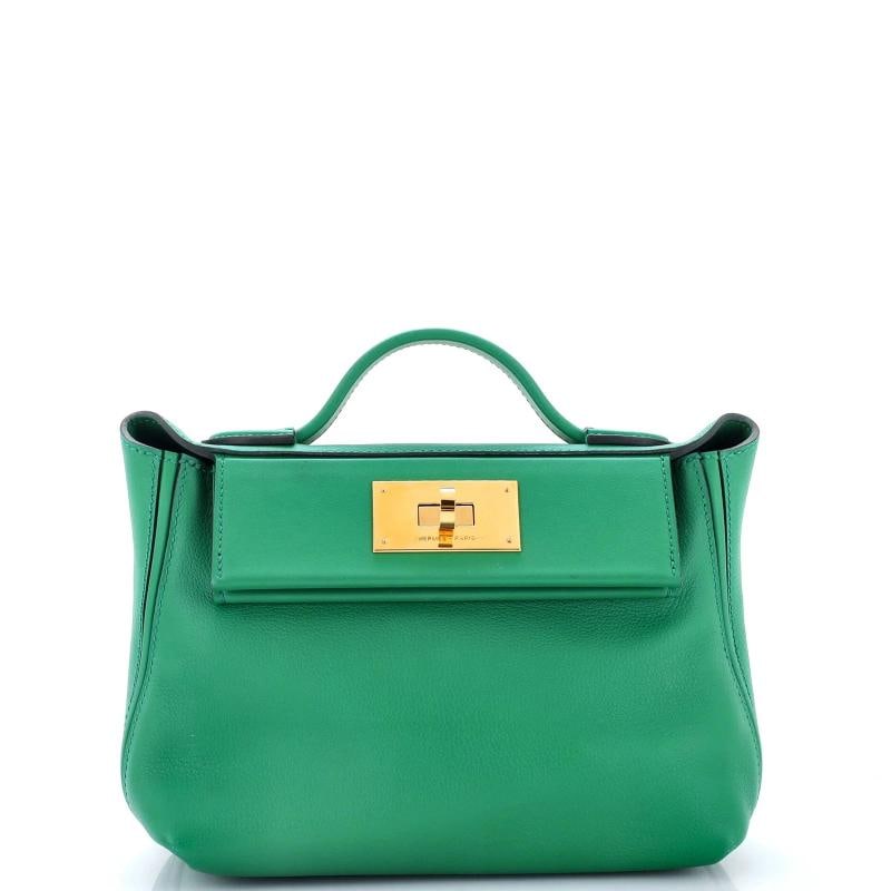 Hermes 24/24 Bag Evercolor with Swift 21: Condition: Pre-owned - Excellent,Brand: Hermes,Exterior Material: Leather,Style: Cross Body Bags,Exterior Color: Green,Department: Women,Size: 21,Accessories: With Strap Condition: Excellent. Exterior