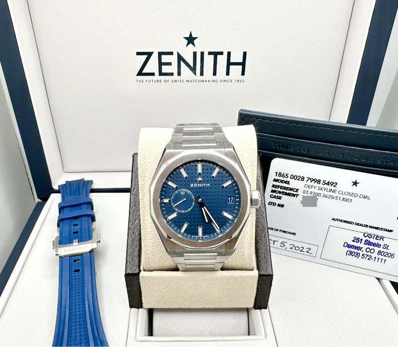 Zenith Defy Skyline 03.9300.3620/51.I001 41mm Blue Dial Steel Box Paper: Style Number: 03.9300.3620/51.1001 Year: 2022 Model: Zenith Defy Skyline Case Material: Stainless Steel Band: Stainless Steel with additional Zenith Blue Rubber Strap Bezel: Stainless Steel Dial: Blue
