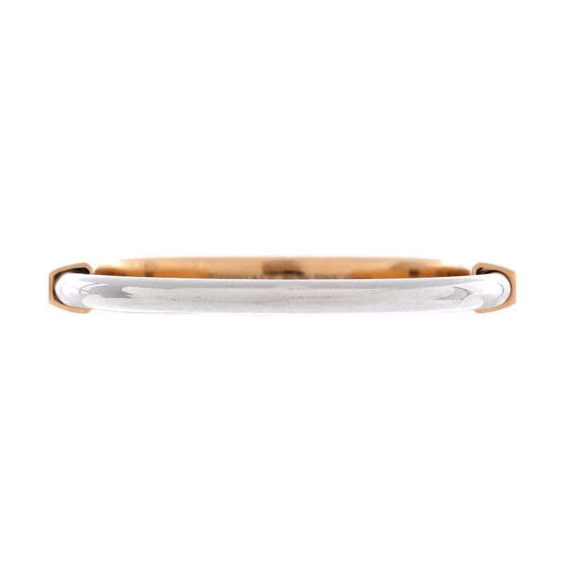 Tiffany & Co. Lock Bangle Bracelet 18K Rose Gold and 18K White Gold: Measurements: Circumference: 6.50 ", Width: 6.00 mm