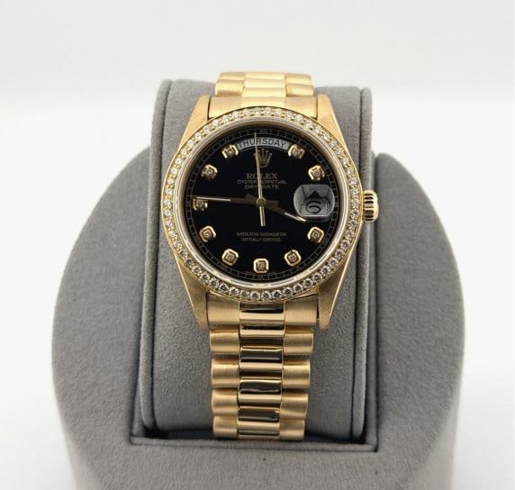 Rolex Day Date President 18038 36mm Quickset Black Diamond Dial & Bezel 18K Gold: Style Number: 18038 Serial: 811**** Year: 1984 Model: Rolex Day Date President Case Material: 18k Yellow Gold Band: Custom 18k Yellow Gold President Bezel: Custom Diamond Bezel Dial: Custom Black Diam