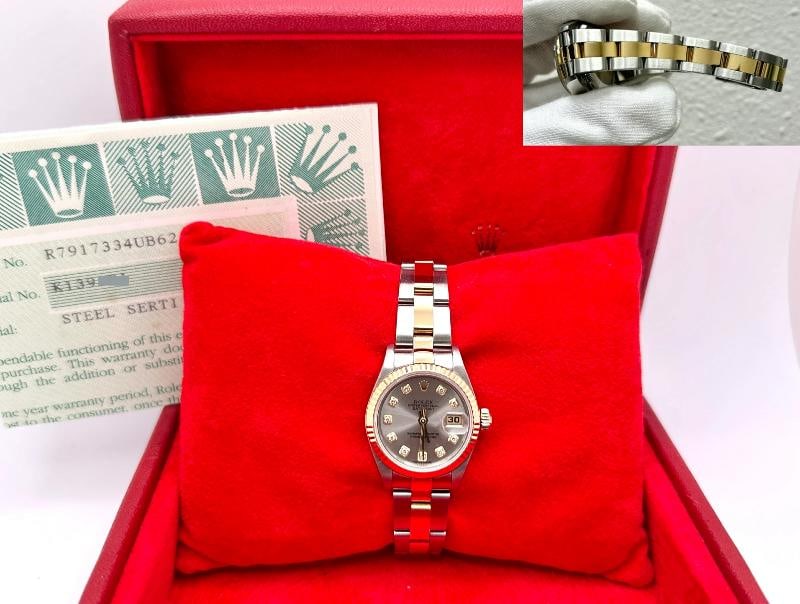 Rolex Ladies Datejust 79173 Steel Serti Diamond Dial 18k Gold Steel Box Paper: Style Number: 79173 Serial: K139*** Year: 2001 Model: Rolex Ladies Datejust Case Material: Stainless Steel Band: 18K Yellow Gold & Stainless Steel Bezel: 18K Yellow Gold Dial: Steel Serti Diamond