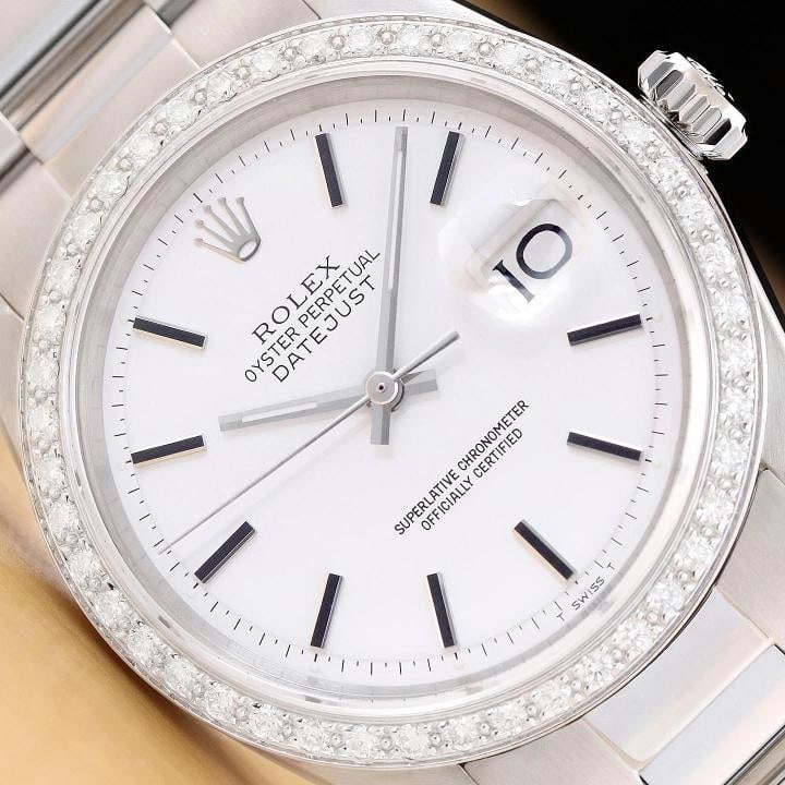 ROLEX DATEJUST 1601 18K GOLD STEEL WHITE DIAL DIAMOND BEZEL OYSTER BAND WATCH: This is an authentic Rolex Datejust 1601 watch with Rolex stick dial Ref., custom 18K white gold diamond bezel, and custom stainless steel oyster bracelet. Descriptions: Brand: Rolex Model: Datejust