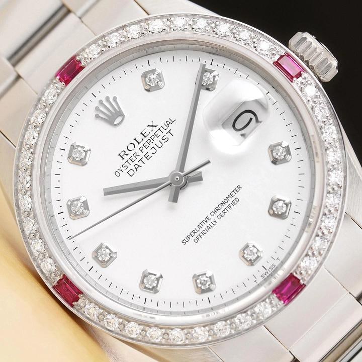 ROLEX MENS DATEJUST WHITE DIAL DIAMOND RUBY 18K GOLD STEEL WATCH w/ OYSTER BAND: This is an authentic Rolex Datejust 1603 watch with Rolex dial Ref. with added genuine diamond markers, custom 18K white gold diamond and ruby bezel, and custom stainless steel oyster bracelet.