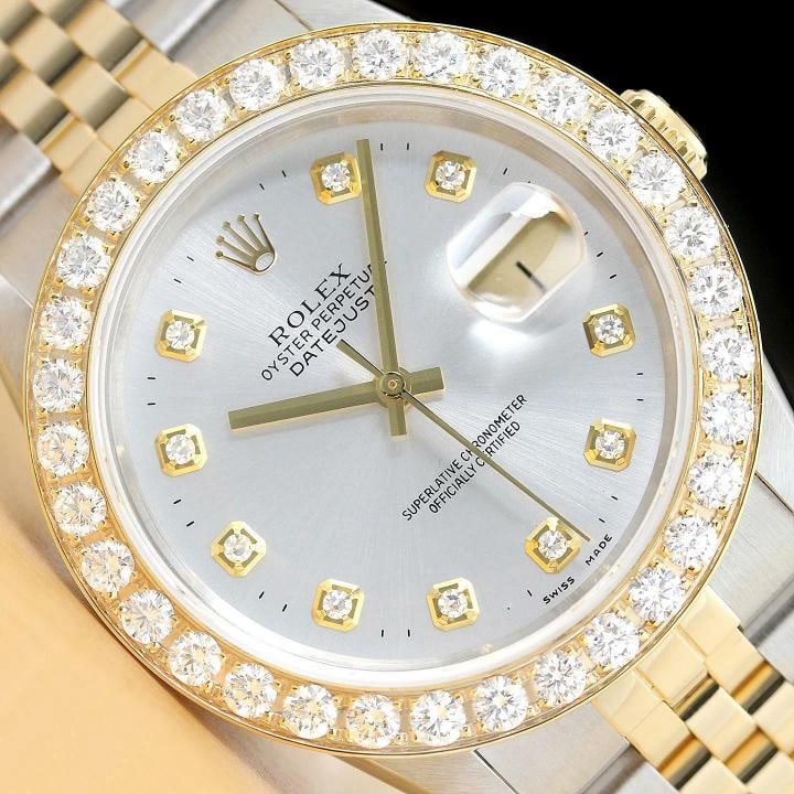 ROLEX MENS DATEJUST 16233 DIAMOND DIAL 2.5 CT BEZEL 18K YELLOW GOLD STEEL WATCH: This is an authentic Rolex Datejust 16233 watch with Rolex 18K yellow gold and stainless steel jubilee bracelet, Rolex dial Ref. with added genuine diamond markers, and custom 18K yellow gold 2.50 CT 