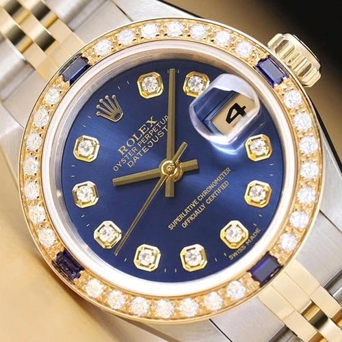 ROLEX LADIES DATEJUST 79173 BLUE DIAL 18K GOLD STEEL DIAMOND SAPPHIRE WATCH: Condition: Pre-owned - Excellent,Bezel Color: Gold,Max Wrist Size: 6.26-6.75 in,Number of Jewels: 31 Jewels,Indices: Diamond Markers, 12-Hour Dial,Band: Rolex Two-Tone Jubilee Bracelet,Bezel: Custom 1
