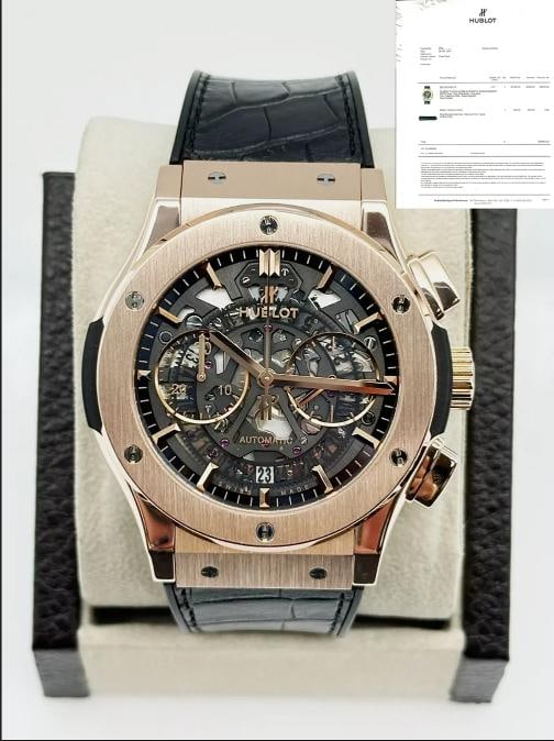 Hublot 525.OX.0180.LR Classic Fusion Aerofusion Chronograph 45mm 18K Rose Gold: Style Number: 525.OX.0180.LR Model: Classic Fusion Aerofusion Year: 2017 Case Material: 18K Rose Gold Band: Leather Bezel: 18K Rose Gold Dial: Black Skeleton Face: Sapphire Crystal Case Size: 45mm