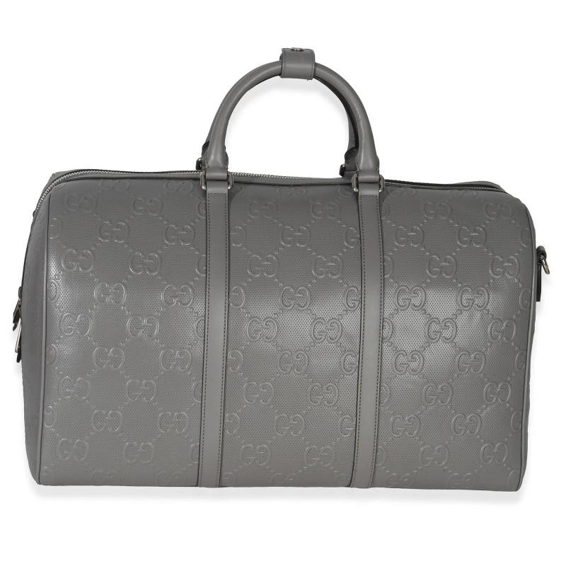 Gucci Grey Embossed Calfskin GG Tennis Medium Duffle Bag: Condition: Pre-owned - Good,Dimensions: 17.5 x 13.5 x 9.25,Handbag Accessories: Care Booklet,Bag Width: 17.5 in,Bag Depth: 9.25 in,Bag Height: 13.5 in,Department: Unisex,Style: Duffle Bag,Material: