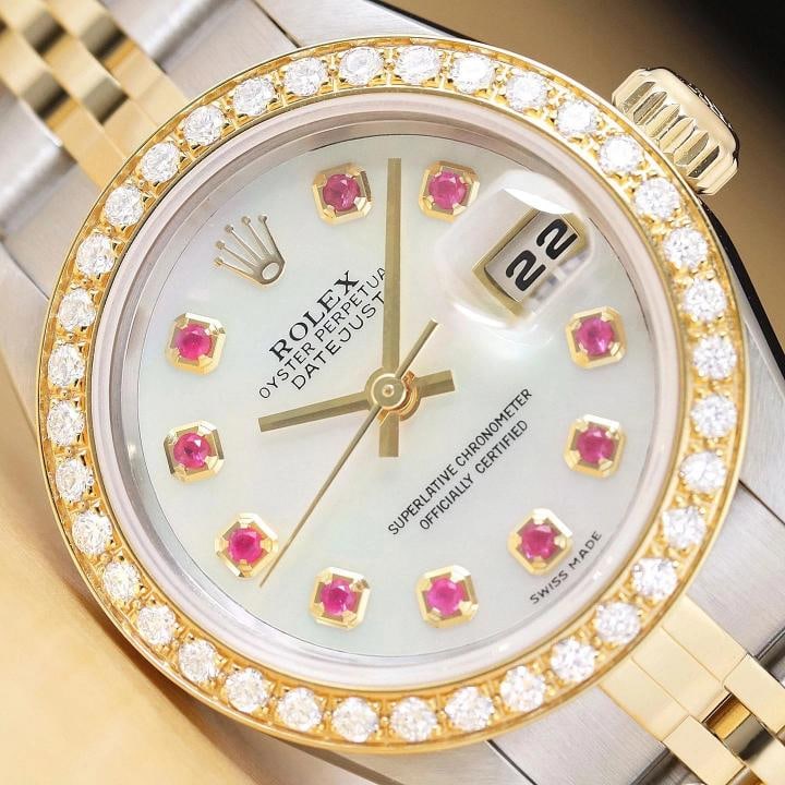 ROLEX LADIES DATEJUST 79173 MOTHER OF PEARL RUBY DIAL 18K GOLD SS DIAMOND WATCH: Condition: Pre-owned - Excellent,Bezel Color: Gold,Max Wrist Size: 6.26-6.75 in,Number of Jewels: 31 Jewels,Indices: 12-Hour Dial, Ruby Markers,Band: Rolex Two-Tone Jubilee Bracelet,Bezel: Custom 18K 