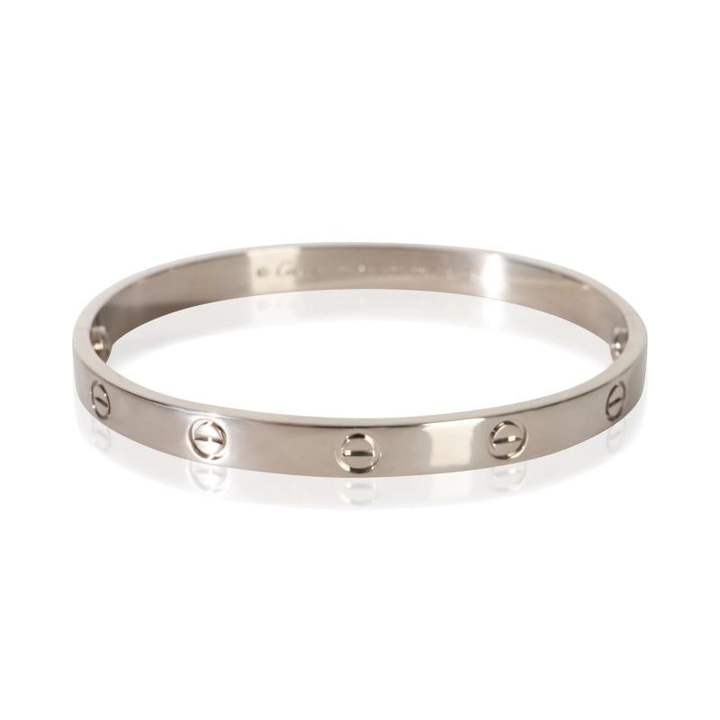 Cartier White Gold Love Bracelet: Condition: Pre-owned,Item Length: 18 cm,Clasp/Buckle Type: Screw,With Original Box/Packaging: Yes,With Papers: Yes,Side Stone Type: No Stone,Metal Purity: 18k,Gross Weight (grams): 35.56,Department: