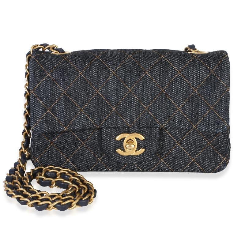 Chanel Dark Blue Quilted Denim Mini Rectangular Flap Bag: Condition: Pre-owned - Good,Dimensions: 7.75 x 5 x 2.5,Handbag Accessories: Box;Dustbag;Gift Ribbon;Retail Tag,Bag Width: 7.75 in,Bag Depth: 2.5 in,Bag Height: 5 in,Department: Unisex,Style: Shoulder