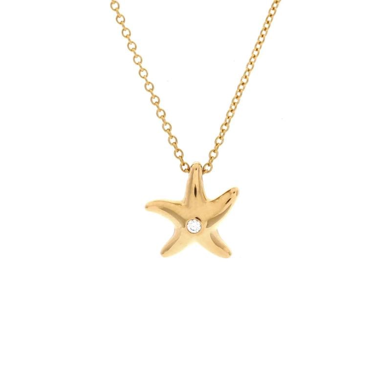 Tiffany & Co. Vintage Starfish Pendant Necklace 18K Yellow Gold with Diamond: Condition: Pre-owned - Good,Brand: Tiffany & Co.,Main Stone: Diamond,Metal: 18K Yellow Gold,Metal Purity: 18K,Style: Pendant,Type: Necklace,Color: Yellow Gold,Material: Unknown Condition: Great. Moder
