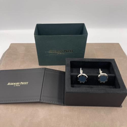 Audemars Piguet Stainless Steel Cufflinks in Blue: Condition: New with imperfections,Brand: Audemars Piguet,Type: Cufflinks,Department: Men,Metal Purity: N/A,Color: Blue,Style: N/A,Metal: Stainless Steel,Country of Origin: Switzerland,Main Stone: No S