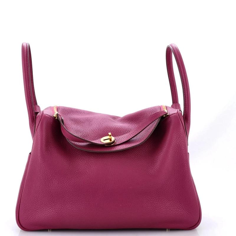 Hermes Lindy Bag Clemence 34: Measurements: Handle Drop 5", Height 9", Width 13", Depth 6", Strap Drop 15" . Condition: Pre-owned - Good,Brand: Hermes,Exterior Material: Leather,Style: Satchels,Exterior Color: Pink,Department: