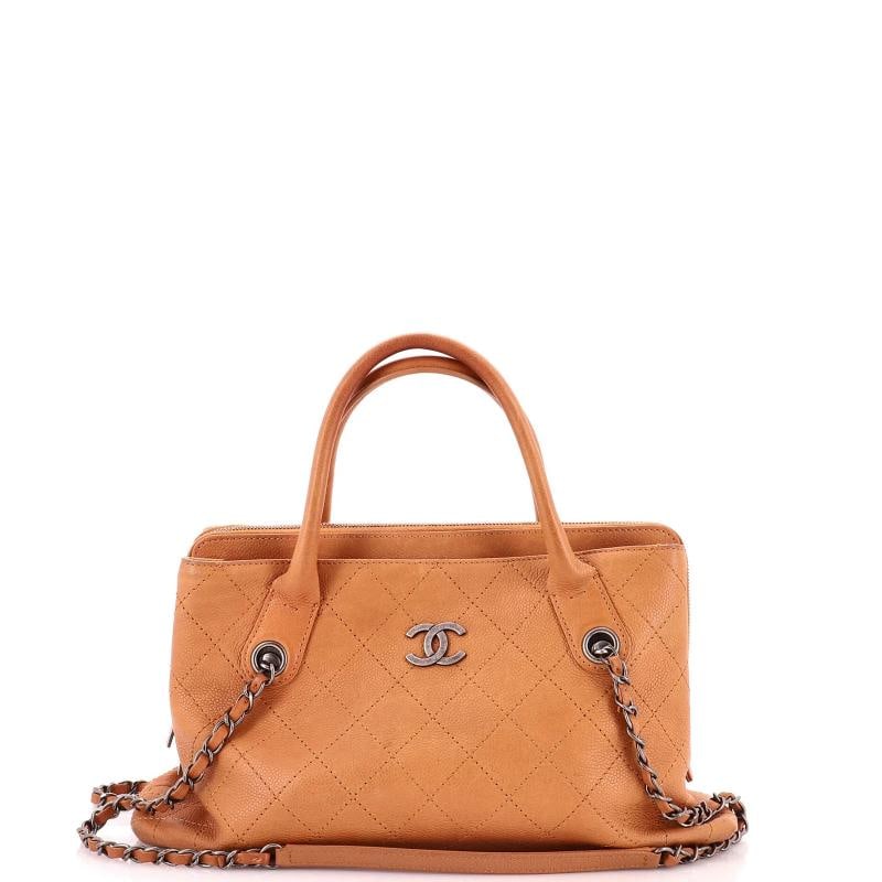 Chanel Urban Shopping Tote Quilted Caviar Small: Measurements: Handle Drop 4", Height 9", Width 13.5", Depth 4", Strap Drop 14" . Condition: Pre-owned - Good,Brand: Chanel,Exterior Material: Leather,Style: Top Handle,Exterior Color: