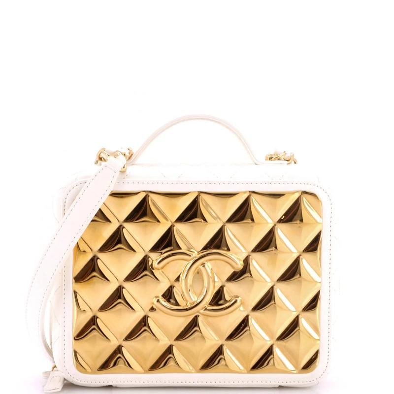Chanel Golden Plate Vanity Case Quilted Metal and Lambskin Medium: Measurements: Handle Drop 1.5", Height 6", Width 8", Depth 3", Strap Drop 22" Condition: Pre-owned - Excellent,Brand: Chanel,Exterior Material: Leather, Metal,Style: Top Handle,Exterior Color: