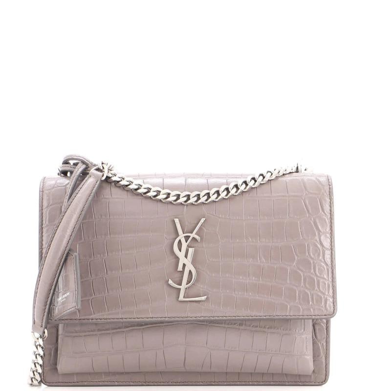 Saint Laurent Sunset Crossbody Bag Crocodile Embossed Leather Medium: Accessories: Clochette Measurements: Handle Drop 11.5", Height 6", Width 8.5", Depth 3", Strap Drop 12-20.5". Condition: Pre-owned - Excellent,Brand: Saint Laurent,Exterior Material: Leather,Style: Cr