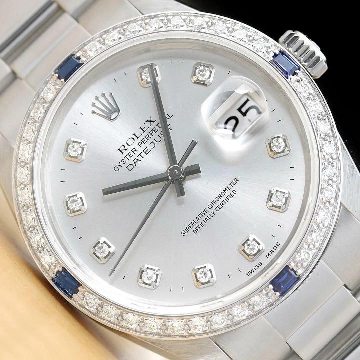 MENS ROLEX DATEJUST 18K WHITE GOLD SAPPHIRE DIAMOND STEEL WATCH 16014: Condition: Pre-owned - Excellent,Bezel Color: Silver,Max Wrist Size: 7.26-7.5 in,Number of Jewels: 27 Jewels,Indices: Diamond Markers, 12-Hour Dial,Bezel: Custom 18K White Gold Sapphire Diamond Bezel,