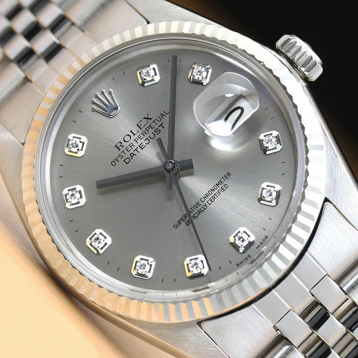 MENS ROLEX DATEJUST 16014 GRAY DIAMOND 18K WHITE GOLD STAINLESS STEEL WATCH: Condition: Pre-owned - Excellent,Bezel Color: Silver,Max Wrist Size: 7.26-7.5 in,Number of Jewels: 27 Jewels,Indices: Diamond Markers, 12-Hour Dial, Multiple Hands,Bezel: Rolex 18K White Gold Fluted B