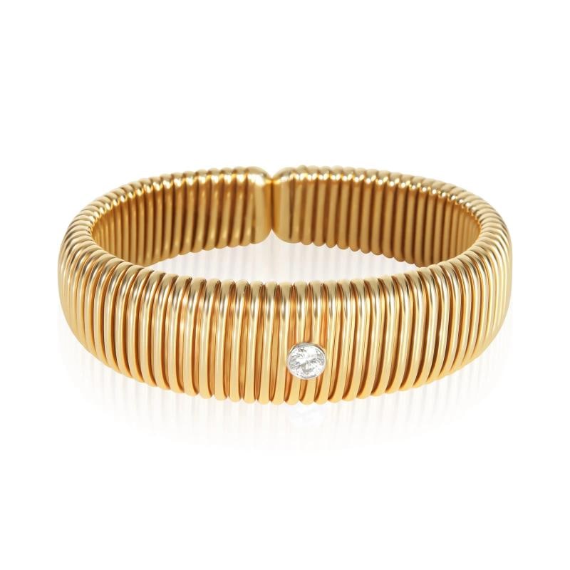 Tiffany & Co. Yellow Gold Diamond Vintage Tubogas Bracelet: Condition: Pre-owned - Good,Shape: Round Brilliant,Item Length: 6 in,Clasp/Buckle Type: No Clasp,Side Stone Type: Diamond,Side Stone Weight (cts): 0.40,Metal Purity: 18k,With Original Box/Packaging: