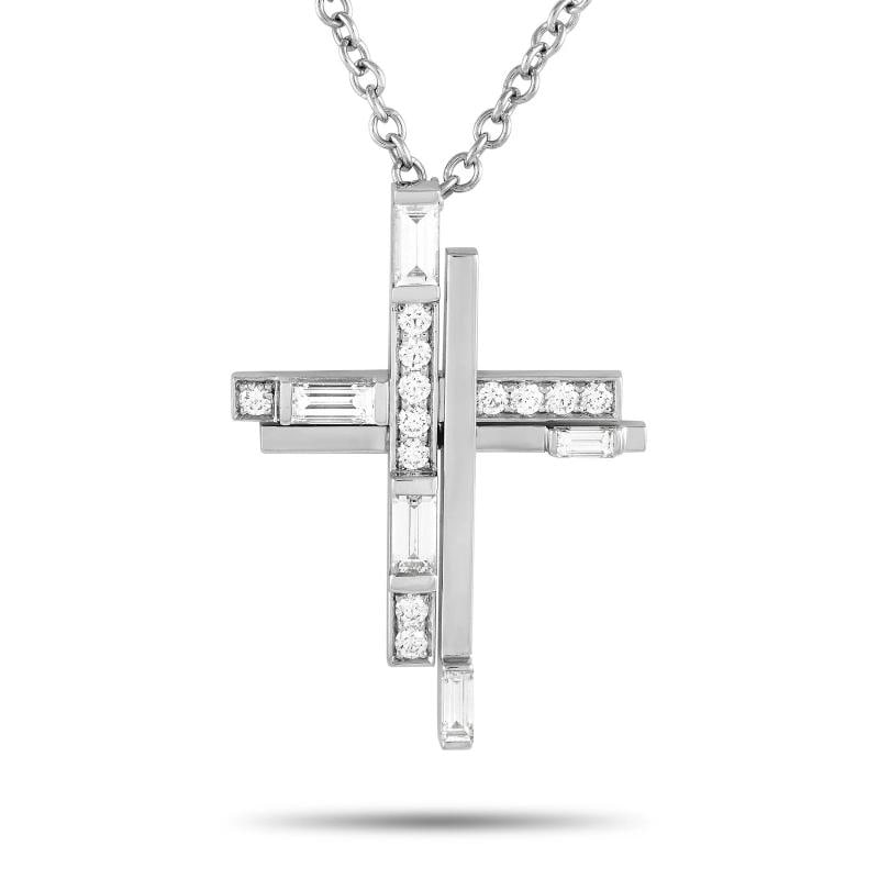 Harry Winston Symbols Platinum 0.72ct Diamond Cross Necklace: The pendant measures 1.15 by 0.75 inches and suspends from a 20-inch-long chain with a lobster clasp. Condition: Pre-owned - Good: This item has been gently used but is in good condition. It might