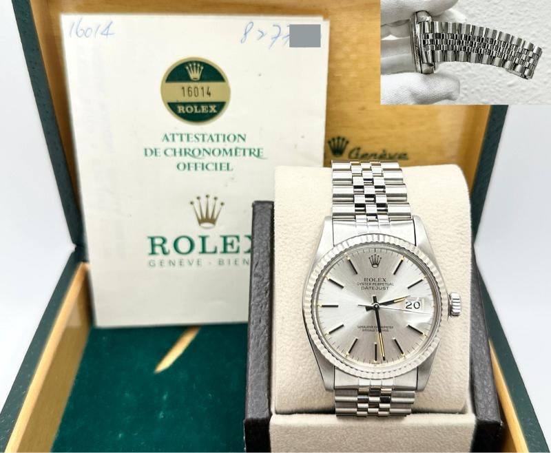 Rolex Datejust 16014 36mm Silver Dial 18k White Gold Bezel Steel Box Paper: Style Number: 16014 Serial: 8277*** Year: 1985 Model: Rolex Datejust Case Material: Stainless Steel Band: Stainless Steel Bezel: 18K White Gold Dial: Silver Case Size: 36mm Includes: - Rolex Box &