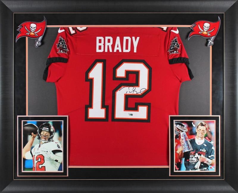 Tom Brady Signed Custom Framed Tampa Bay Buccaneers Jersey (Fanatics): Player: Tom Brady,Product: Jersey,Original/Reprint: Original,Team: Tampa Bay Buccaneers,Autograph Authentication: FAN,PRODUCT_COA: FAN,PRODUCT_SIGNED_BY_BRAND: Tampa Bay
