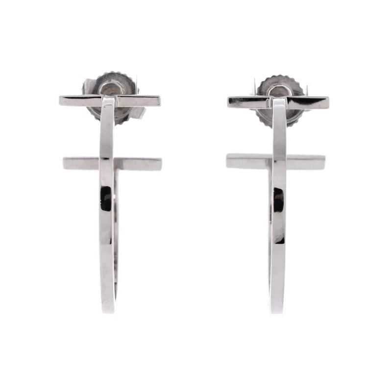 Tiffany & Co. T Wire Hoop Earrings 18K White Gold Medium: Measurements: Height/Length: 10.4 mm, Width: 22 mm . Condition: Pre-owned - Good,Brand: Tiffany & Co.,Main Stone: Unknown,Metal: 18K White Gold,Metal Purity: 18K,Style: Hoop,Type: Earrings,Color: Whit