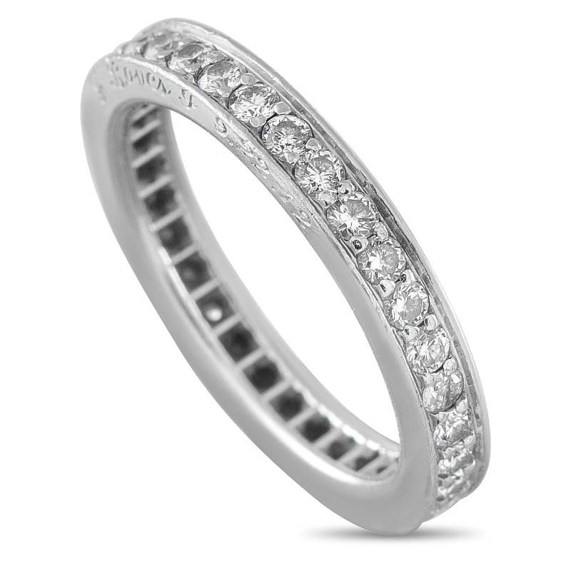 Cartier Platinum 0.66ct Diamond Eternity Band Ring: measures 2mm wide, features a 2mm top height, and weighs 4.4 grams. Condition: Pre-owned - Good: This item has been gently used but is in good condition. It might have a few signs ... Read moreabout