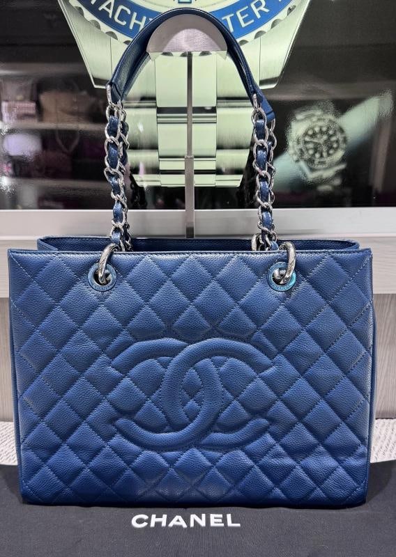 Chanel Caviar Quilted Grand Shopping Tote GST in Royal Blue: Condition: Pre-owned - Excellent,Bag Width: 13.5",Bag Height: 9.5",Lining Material: Satin,Bag Depth: 5.25",Fabric Type: Satin,Exterior Material: Caviar,Brand: CHANEL,Department: Women,Exterior Color: 