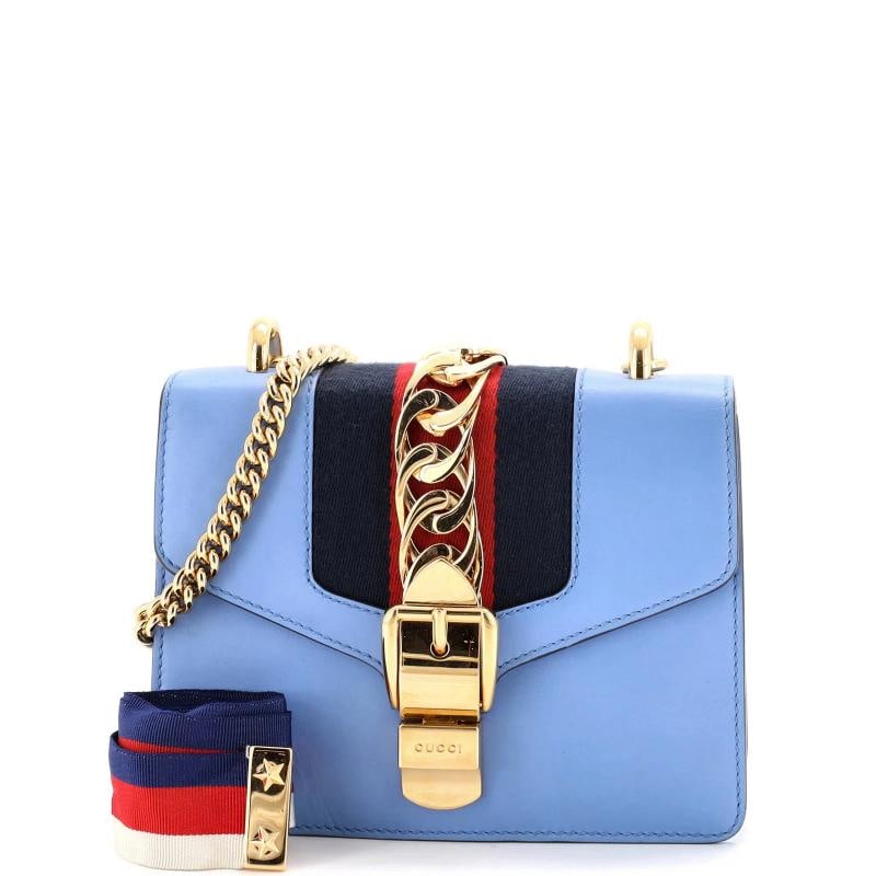 Gucci Sylvie Chain Shoulder Bag Leather Mini: Condition: Pre-owned - Good,Brand: Gucci,Exterior Material: Leather,Style: Cross Body Bags,Exterior Color: Blue,Department: Women,Size: Mini,Accessories: Extra Strap, With Strap Estimated Retail