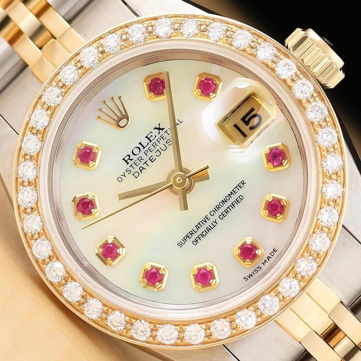 ROLEX LADIES DATEJUST 69173 MOTHER OF PEARL RUBY DIAMOND 18K GOLD STEEL WATCH: Condition: Pre-owned - Excellent,Country of Origin: Switzerland,Department: Women's,Brand: Rolex,Style: Dress/Formal, Luxury: Dress Styles,Features: 12-Hour Dial, Chronometer, Sapphire Crystal, Screwd