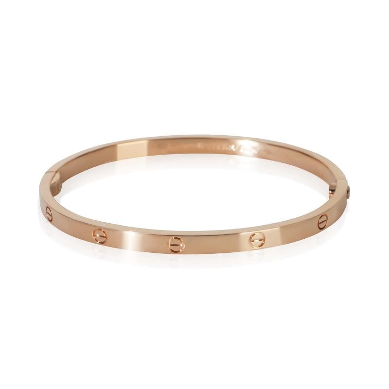 Cartier Rose Gold Small Model Love Bracelet: Condition: Pre-owned,Item Length: 16 cm,Clasp/Buckle Type: Screw,With Original Box/Packaging: Yes,With Papers: Yes,Side Stone Type: No Stone,Metal Purity: 18k,Gross Weight (grams): 17.83,Department: