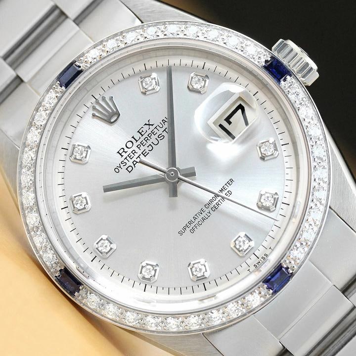 MENS ROLEX DATEJUST 1603 SILVER 18K GOLD SAPPHIRE DIAMOND STEEL OYSTER WATCH: Condition: Pre-owned - Excellent,Bezel Color: Silver,Max Wrist Size: 7.26-7.5 in,Number of Jewels: 26 Jewels,Indices: Diamond Hour Marks, 12-Hour Dial, Multiple Hands,Bezel: Custom 18K White Gold Sapp