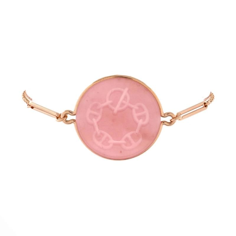 Hermes Ex-Libris Bracelet 18K Rose Gold with Pink Chalcedony Large: Condition: Pre-owned - Good,Brand: Hermes,Main Stone: Unknown,Metal: 18K Rose Gold,Metal Purity: 18K,Style: Bracelet,Type: Bracelet,Color: Rose Gold,Material: Unknown Condition: Good. Moderately