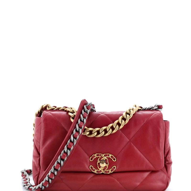 Chanel 19 Flap Bag Quilted Leather Medium: Accessories: With Strap Measurements: Handle Drop 7", Height 7.5", Width 11", Depth 2", Strap Drop 16-19". Condition: Pre-owned - Excellent,Brand: Chanel,Exterior Material: Leather,Style: Cross Body