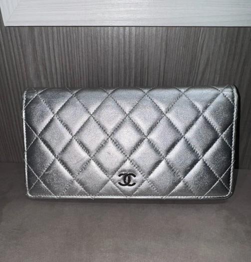 Chanel Metallic Silver Long Wallet 15287812 (2011): Condition: Pre-owned - Good,Brand: CHANEL,Type: Wallet,Department: Women,Color: Silver,Theme: Metal This Pre-owned Chanel Metallic Silver Long Wallet from the 2011 collection is a stunning and