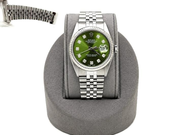 Rolex Datejust 16014 36mm Green Diamond Dial 18k Gold Bezel Stainless Steel: Style Number: 16014 Serial: 573**** Year: 1978 Model: Rolex Datejust Case Material: Stainless Steel Band: Stainless Steel Bezel: 18k White Gold Fluted Bezel Dial: Custom Green Diamond Dial Case Size: