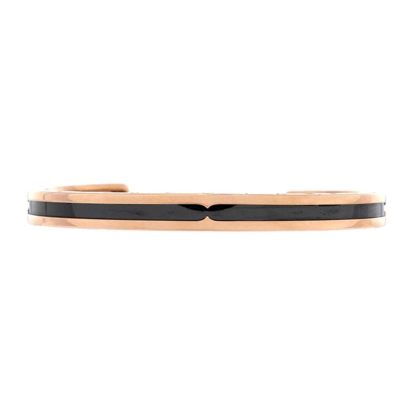 Bvlgari B.Zero1 Cuff Bracelet 18K Rose Gold and Coated Stainless Steel: Measurements: Circumference: 6.5 ", Width: 6 mm Condition: Pre-owned - Good,Brand: Bvlgari,Main Stone: Unknown,Metal: 18K Rose Gold,Metal Purity: 18K,Style: Cuff,Type: Bracelet,Color: Rose