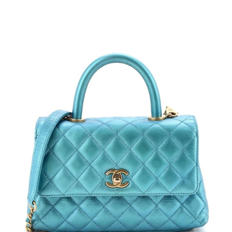 Chanel Coco Top Handle Bag Quilted Iridescent Caviar Mini: Condition: Pre-owned - Good,Brand: Chanel,Exterior Material: Leather,Style: Top Handle,Exterior Color: Blue,Department: Women,Size: Mini,Accessories: Authenticity Card, With Strap