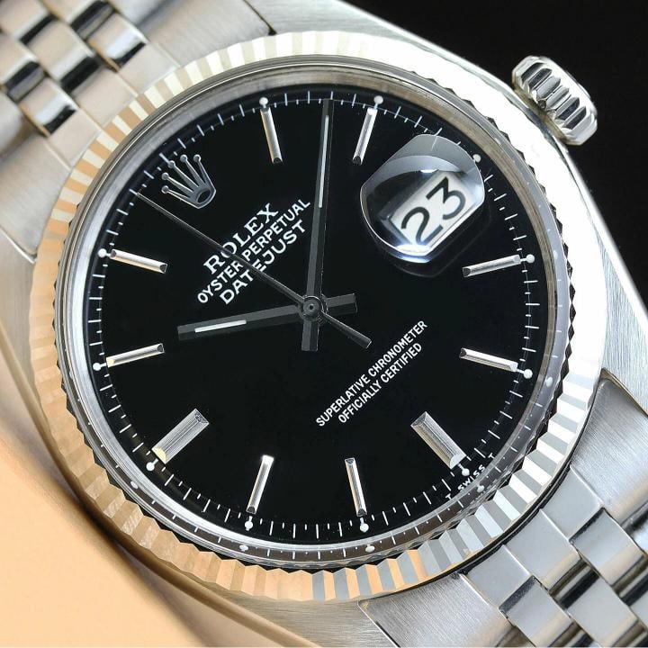 ROLEX MENS DATEJUST BLACK 18K WHITE GOLD BEZEL STEEL FOLDED BAND WATCH: Condition: Pre-owned - Excellent,Bezel Color: Silver,Max Wrist Size: 7.26-7.5 in,Number of Jewels: 26 Jewels,Indices: Stick Indexes, 12-Hour Dial, Multiple Hands,Bezel: Rolex 18K White Gold Fluted Bez
