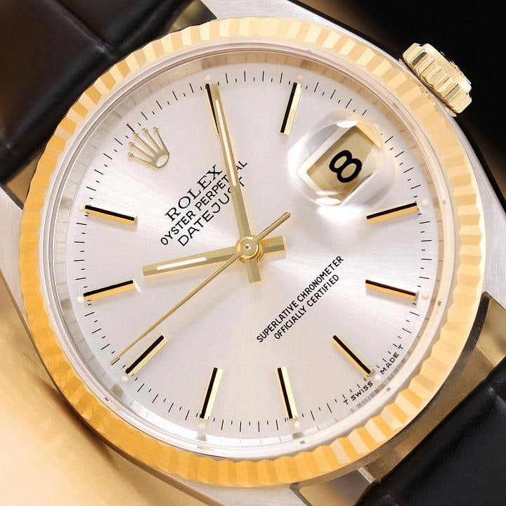 ROLEX MENS DATEJUST 16233 SILVER DIAL 18K GOLD STEEL WATCH w/ BLACK LEATHER BAND: This is an authentic Rolex Datejust 16233 watch with Rolex stick dial Ref., Rolex 18K yellow gold fluted bezel, and custom genuine black leather strap. Descriptions: Brand: Rolex Model: Datejust